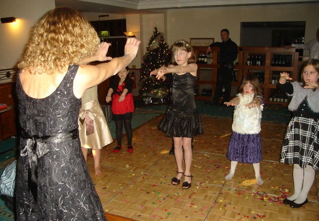 children dancing with help from Sandy